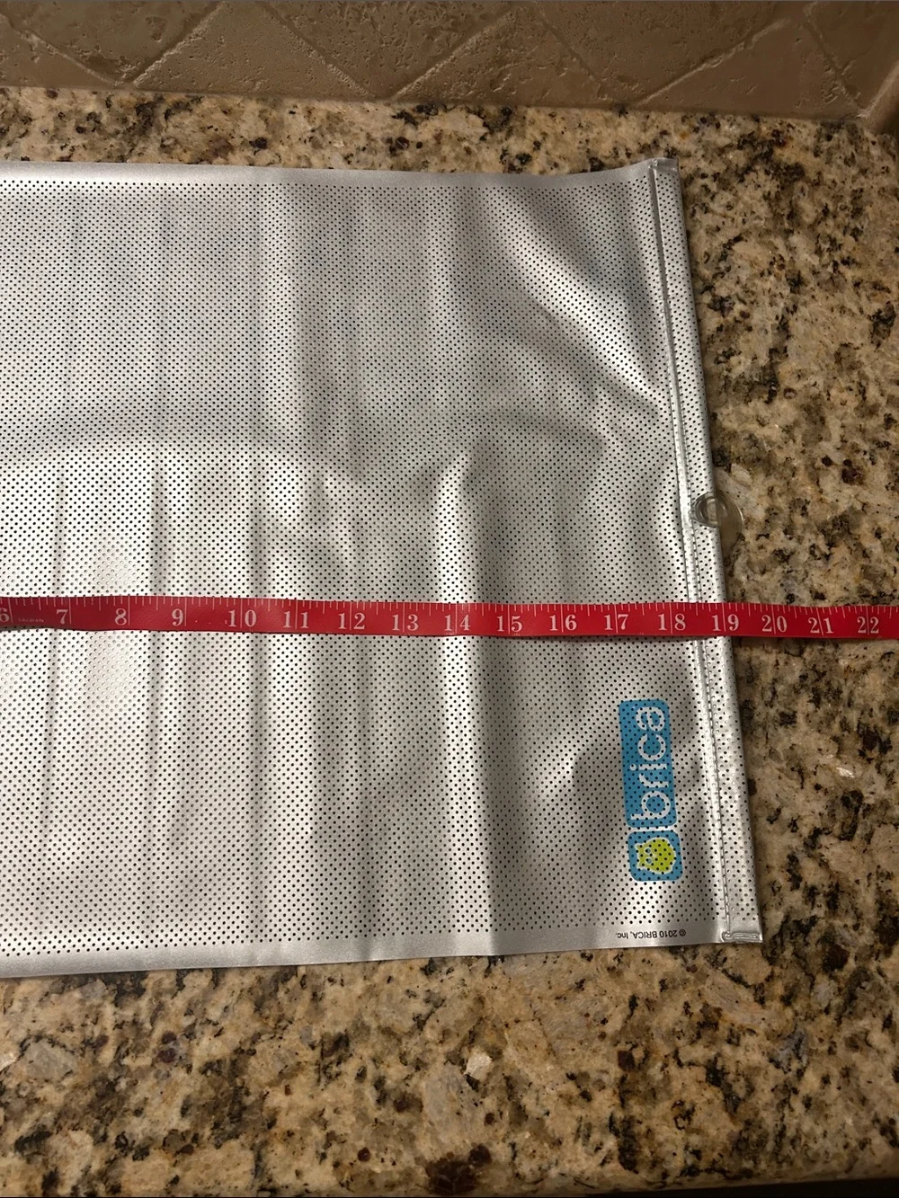 Bric's White Mesh Window Shade with Blue Logo
